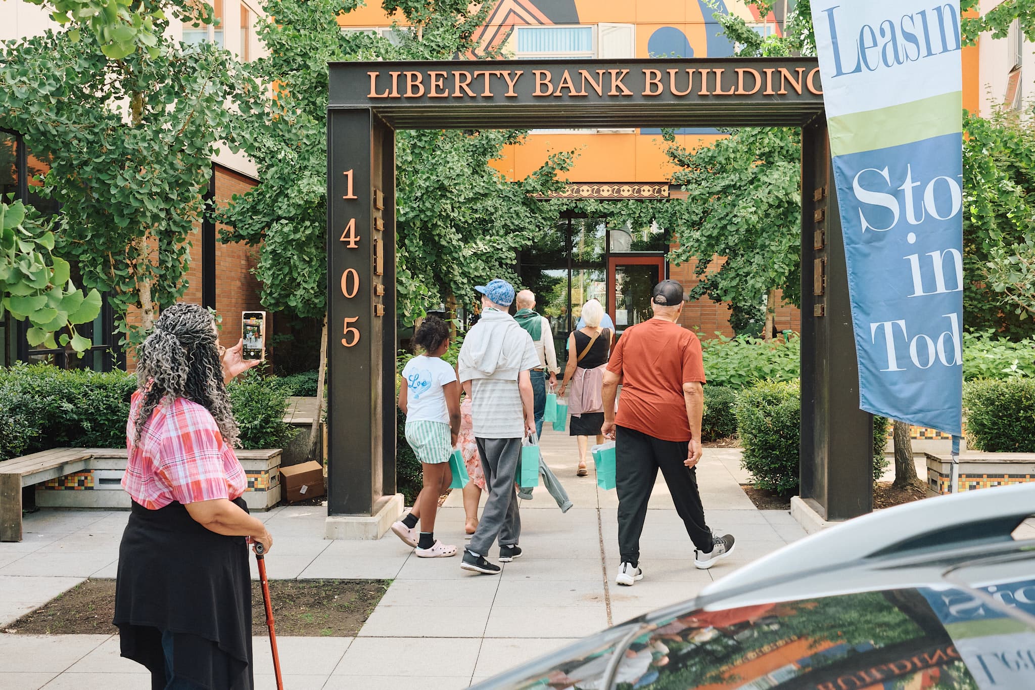 Tour group entering the Liberty Bank Building property