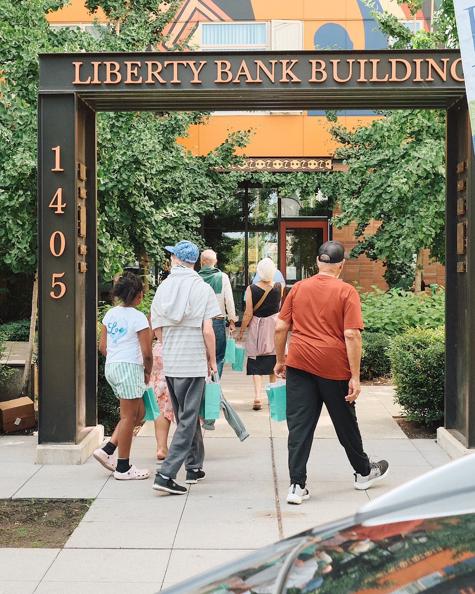 Tour group entering the Liberty Bank Building property